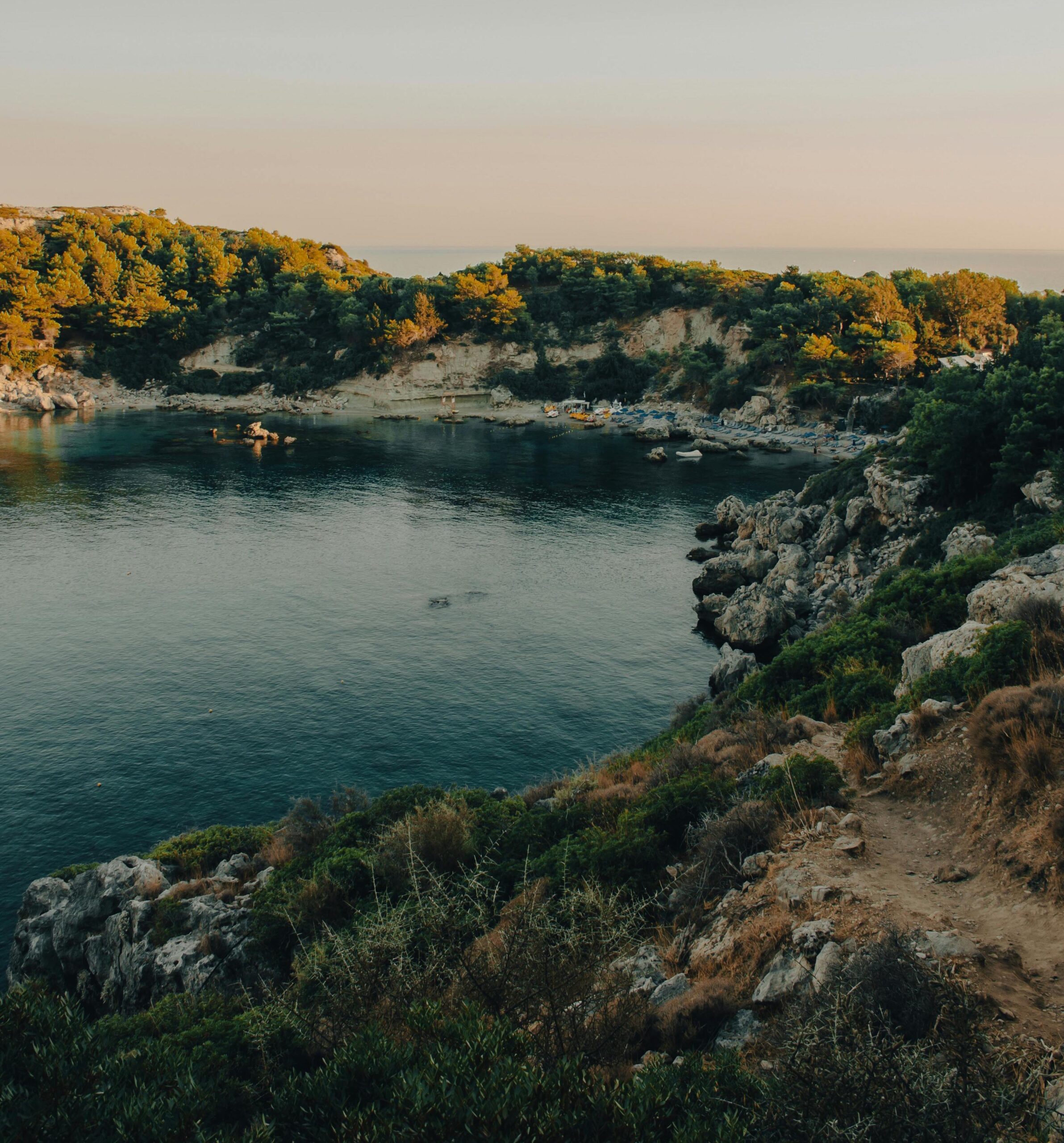 Beautiful emerald waters of the famous Anthony Quinn Bay beach near Kouros Home and Suites in Faliraki Rhodes