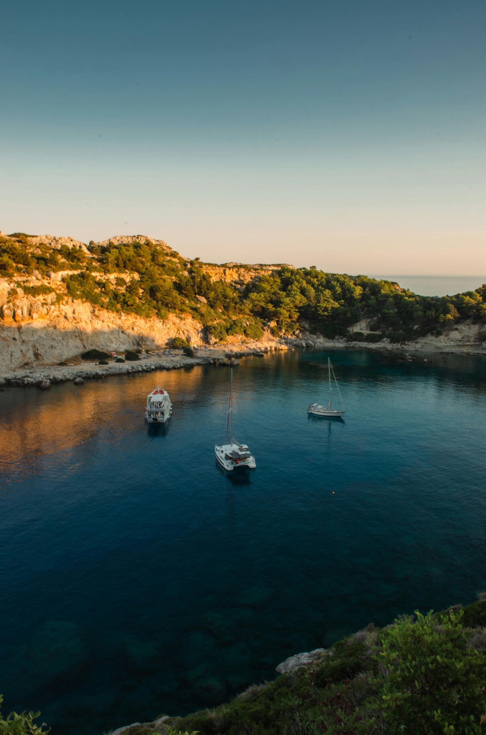 Beautiful emerald waters of the famous Anthony Quinn Bay beach near Kouros Home and Suites in Faliraki Rhodes